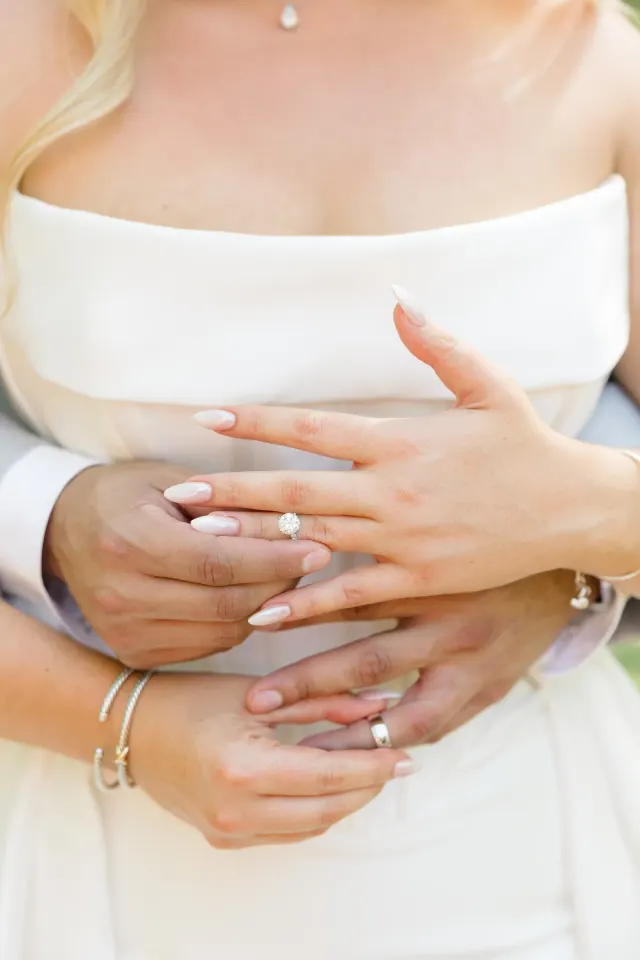 Wedding rings resting on a linen napkin